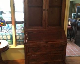 Great condition secretary two piece furniture piece.