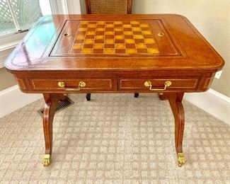 Maitland-Smith game table with brass casters