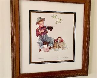 Framed Norman Rockwell art.