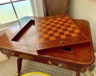 Maitland-Smith game table with brass casters