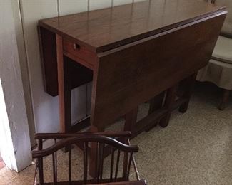 Nice sized gate-leg table, wooden magazine rack.