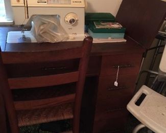 Singer machine in cabinet