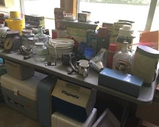 More coolers, thermoses, old jars, ice cream maker.
