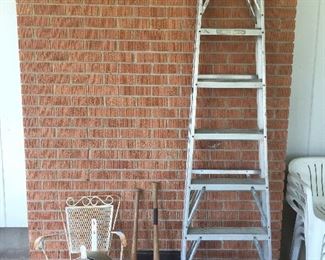 Another ladder, cool chair, baseball bats.