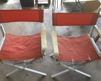 Pair of folding aluminum directors chairs.