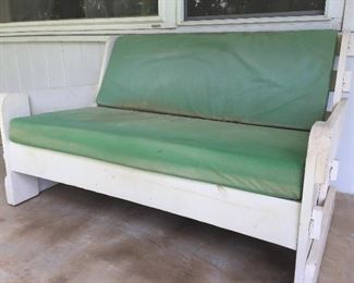 Outdoor wooden bench with vinyl cushions
