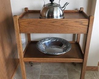 Vintage Tea Cart with Dovetail Drawer and Casters, Large Pewter Bowl, Stainless Teapot.
Lot Number: 18