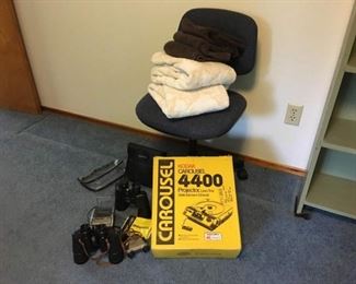 Vintage Kodak Carousel 4400 Projector, Vintage Binoculars, Office Calculator, Chair, Soft Towels.
Lot Number: 59