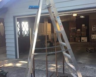 Keller 8' Aluminum Step Ladder, Three Wood Handled Shovels, Two Rakes.
Lot Number: 72