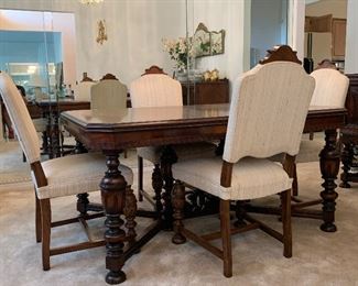 West End Furniture Co. antique dining table and chairs. Approximately 100 years old in excellent condition. Table is 45 x 60.