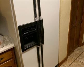 Kenmore SXS Refrigerator with water and ice on the door