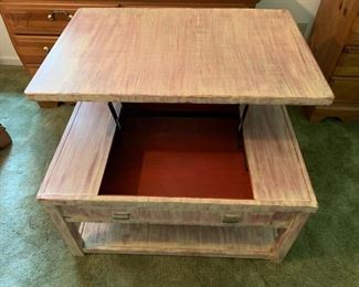 Distressed table showing lift top
