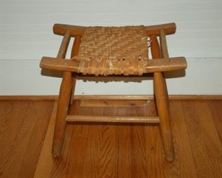 Curved, weaved stool
