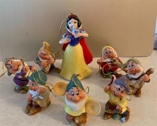 Vintage Disney Snow White and the Seven Dwarfs porcelain figurines.