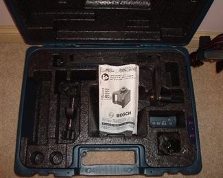Dining Room: This is the hard case and manual for the like-new BOSCH GRL 300 HVG-Rotary Laser.