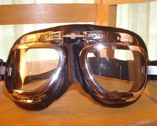 Living Room: HALYCON motorcycle vintage-style British aviator goggles are black and silver.