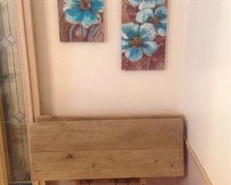 Dining Room: Shown is one of two 15" extensions for the RESTORATION HARDWARE reclaimed oak wood table. The two floral canvas pieces of art are also for sale.