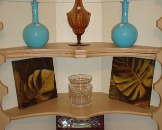 Kitchen: One of two built corner display cabinets shows decorative bottles, two prints, a WATERFORD biscuit jar, and a boxed ARTHUR COURT salad set (a great gift!).