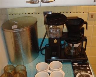 Kitchen: The coffee bar!!!! A ROK espresso coffee machine is to the left of European MOCCAMASTER/Techni Vorm coffee machine. Five gold glass votives and four coffee mugs are also shown.