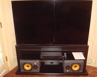 Family Room: A BRAVIA SONY 68" flat screen TV rests on a PRO-FORM Flat Panel TV Base that measures 61" wide at the top. The speakers and disc player photos follow.