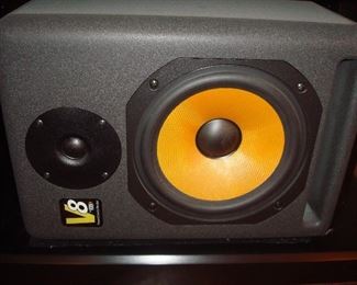Family Room: A pair of V8-Powered Studio Monitor KRK speakers include their original boxes. The speakers measure 16" tall x 11" wide x 12" deep.