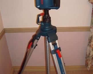 Dining Room: A like-new BOSCH GRL 300 HVG-Rotary Laser AND BOSCH BT300 HD Professional Tripod are priced as a unit. The laser's case and manual are included and are pictured in the next photo.