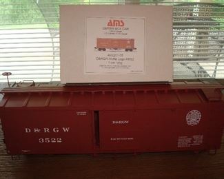 Living Room: The ACCUCRAFT D&RGW (AM2201-05) Box Car #3522 is 20-l/2" long and has its original box as shown. It is 1:20.3 scale, 45m gauge.