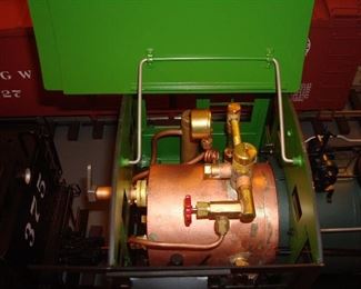 Living Room: This is a closer photo of the engine's boiler. Its serial number is #62445; and its specific boiler certificate is included.