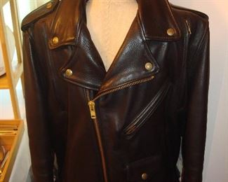 Living Room: A like-new black leather motorcycle jacket is in the "Terminator 2" style. There are no labels inside but it is probably a size medium.