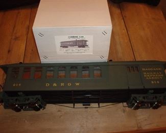 Living Room: This is an ACCUCRAFT D&RGW "Combine Car" (AM54-021) in green with its original box. It measures 28" long and is 1:20.3 scale/45mm gauge.