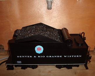 Living Room: The Denver & Rio Grande Western #375 coal tender is 14" long and comes with its original wooden box, as shown. The fuel reservoir is shown in the next photo. It is 1:20.3 scale, 45mm gauge.