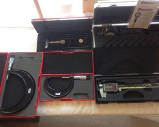 Living Room: These top quality STARRETT tools are like brand new! There are Micrometers and other items in their original cases.