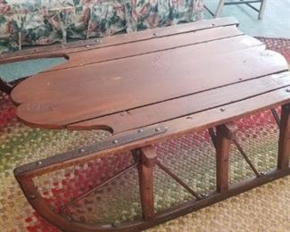 large old sleds make a great coffee table