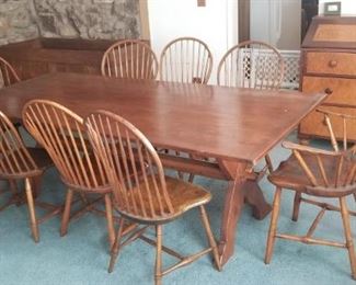 antique harvest table with bread board ends and bow back windsors