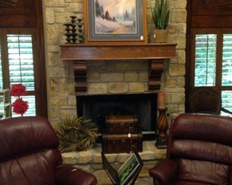 Cozy up to another fireplace in matching recliners