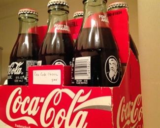 Classic Coca-Colas in a carton