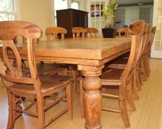 Amazing dining room table - seats 10 comfortably, includes 12 chairs.