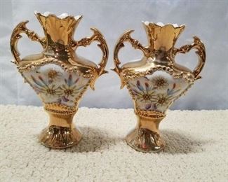 Ornate gold gilded ceramic urn style vases