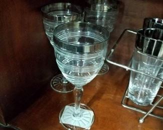 6 Matching lined wine glasses with silver rims  