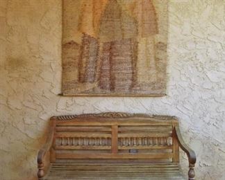 Rustic bench and tapestry