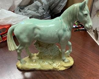 Antique horse figurine.