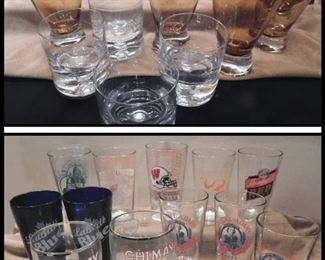Bar Glasses. some are Chimay,  Samuel Addams, and Football Themed. 