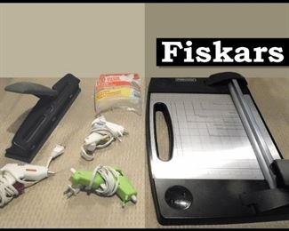 Fiskars Paper Cutter, Three-hole Punch, Glue Guns and Glue Sticks.