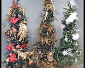 Three Decorated Christmas Trees approximately seven feet tall. 