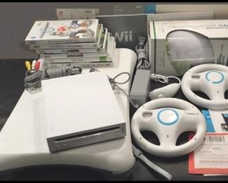  Wii Game. Includes MarioKart, Summer Sports, Sim's Castaway, Mario Party, WiiFit and Golf.
