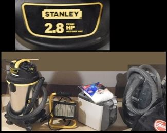 Cleaning Items including a convenient sized Stanley Shop Vac and a Heavy Duty Portable Light. 
