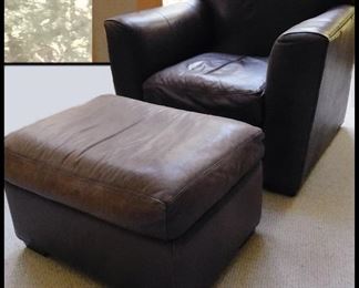  Brown Leather Chair and Ottoman. The Ottoman shows wear, but is still a comfortable classic. 