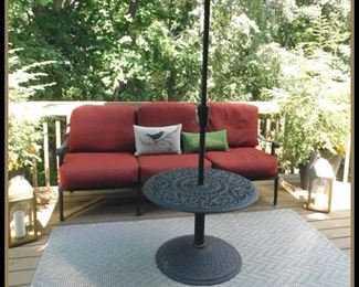  Patio Furniture. Cushioned Outdoor Bench and Metal Table that holds an umbrella. (no umbrella included) 