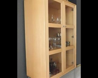Contemporary Cabinet with Glass Shelving. It measures 37" x 20" x 65".