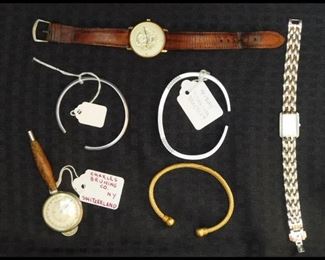 Watches, Opisometer,  Titanium Q-Ray Bracelet  and more.